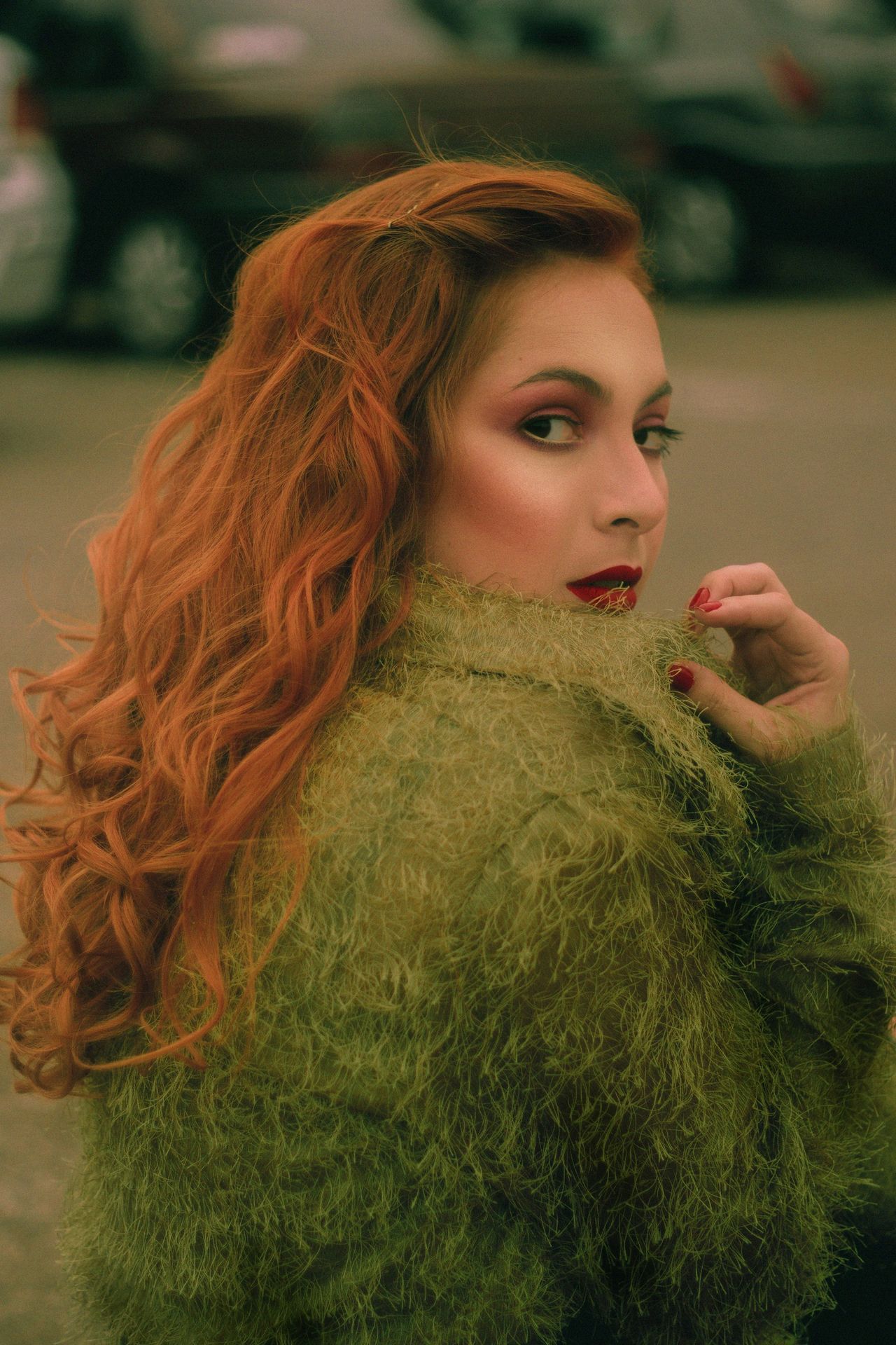 woman in green knit sweater